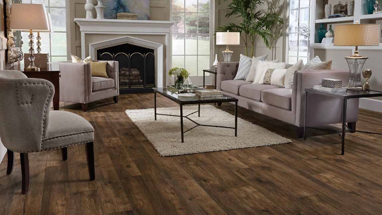 dark hued wood look laminate planks in a classic formal living room